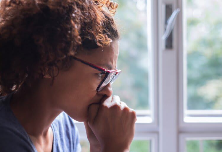 Strategies to Overcome Cognitive Distortions and Combat Negative Thoughts A woman combatting with cognitive distortions and negative thoughts.